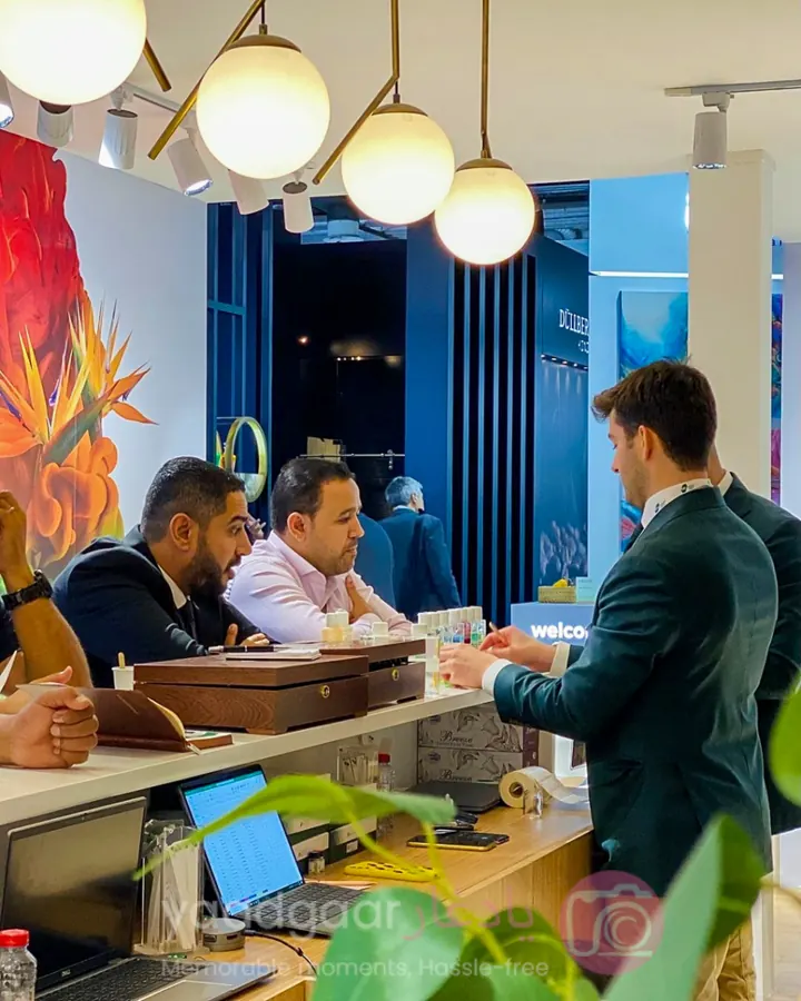 Business meeting at an exhibition booth